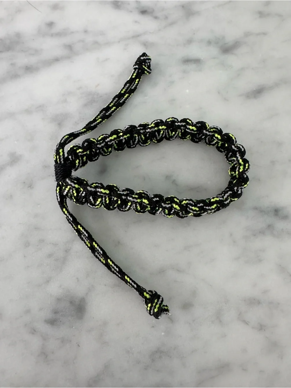 Black and green snake knot bracelet